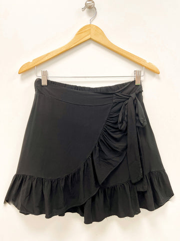 Falda negra lazada Dravita