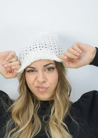 White wool pompom hat